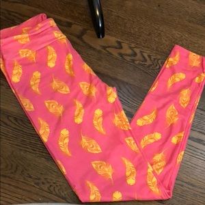 Pink and yellow feather Lularoe leggings OS.